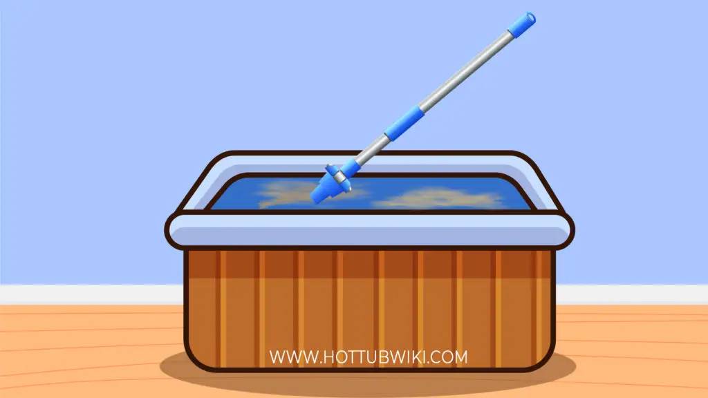 You can use a spa wand to clean the bottom of your hot tub.